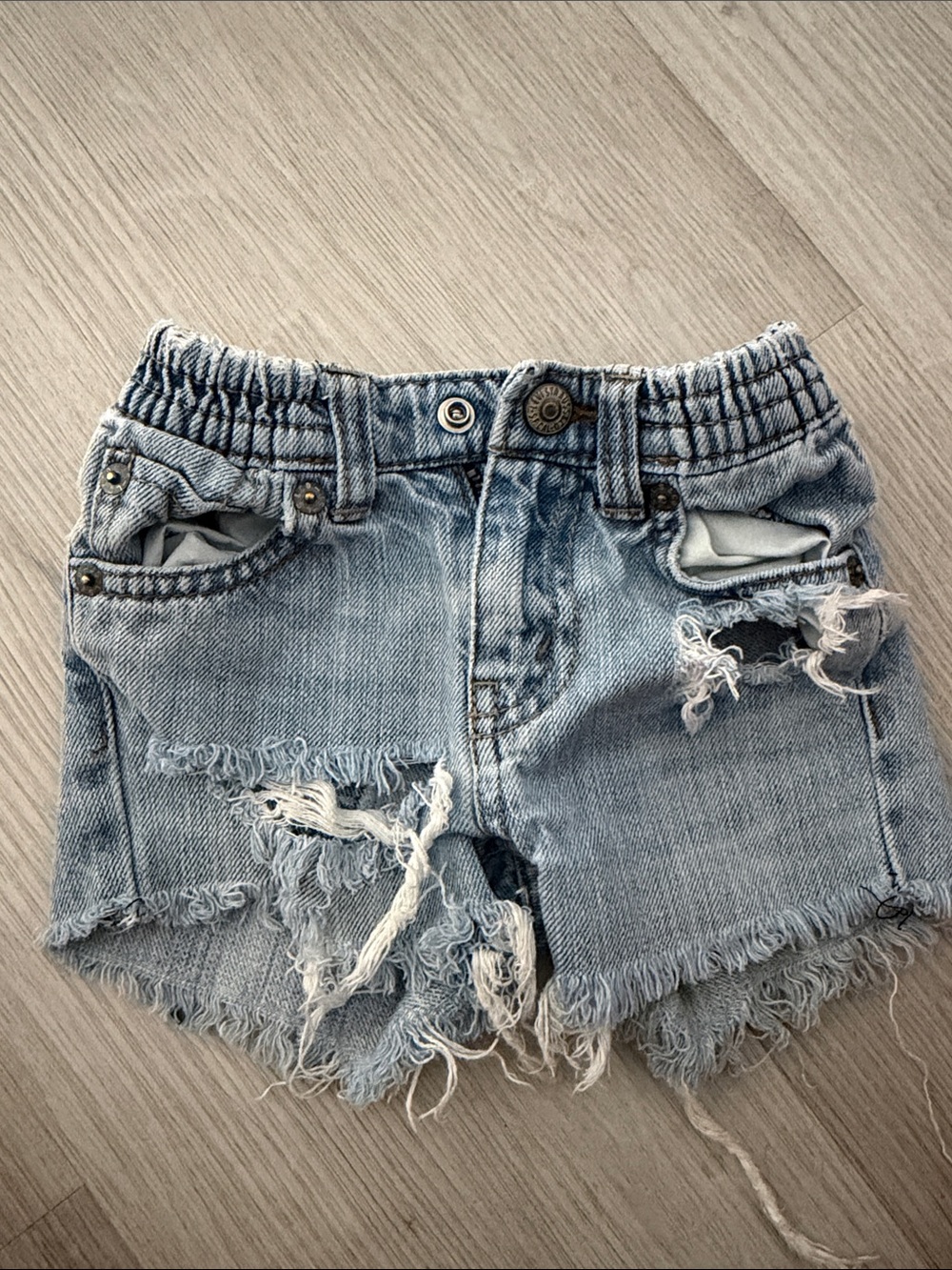 Distressed Light Wash Denim Shorts